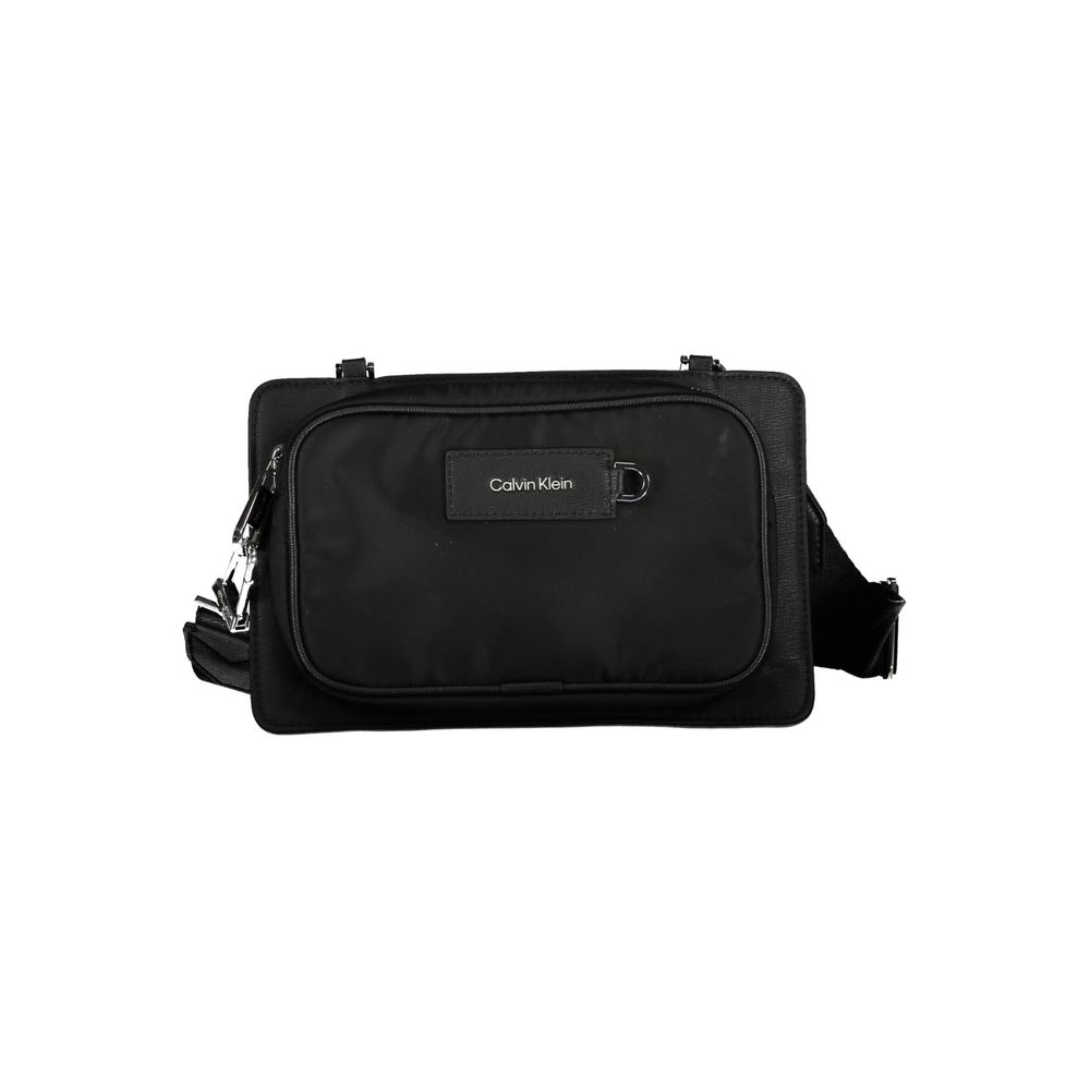 Black Polyester Shoulder Bagadjustable and removable shoulder strap. 1 external pocket, contrasting details, zip closure, logo, 60% recycled polyesterBlack Polyester Shoulder Bag${tagsCalvin KleinAulae Black Polyester Shoulder Bag Calvin KleinAulae Black