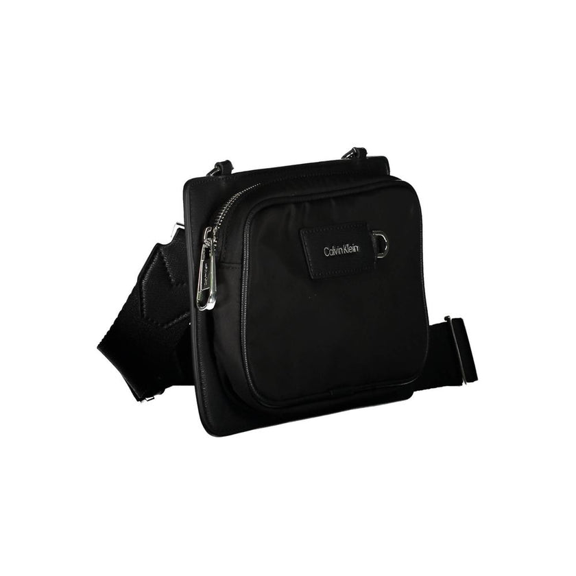 Black Polyester Shoulder Bagadjustable and removable shoulder strap. 1 external pocket, contrasting details, zip closure, logo, 60% recycled polyesterBlack Polyester Shoulder Bag${tagsCalvin KleinAulae Black Polyester Shoulder Bag Calvin KleinAulae Black