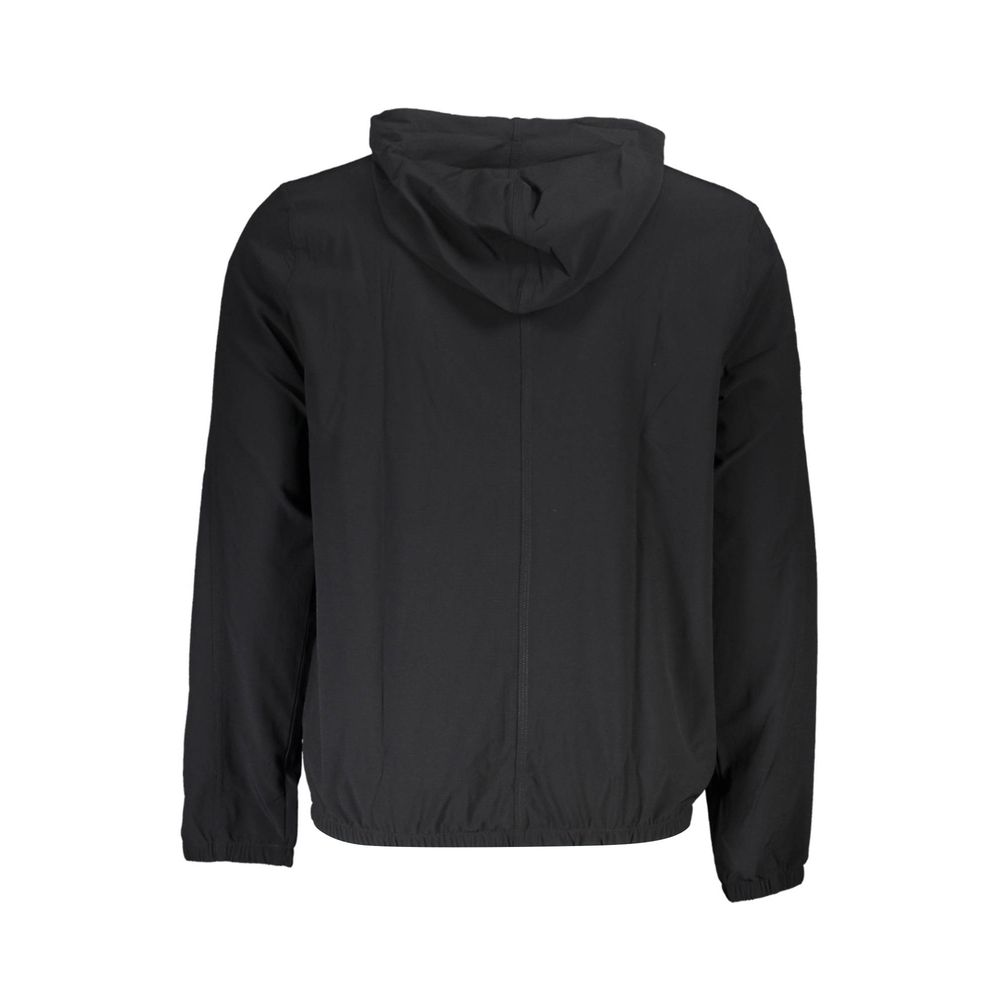 Black Polyester Men SweatshirtElevate your streetwear with this sleek Calvin Klein long-sleeved sweatshirt, expertly crafted for the modern trendsetter. Designed with performance in mind, this hoodie features a technical fabric blend that’s both breathabl