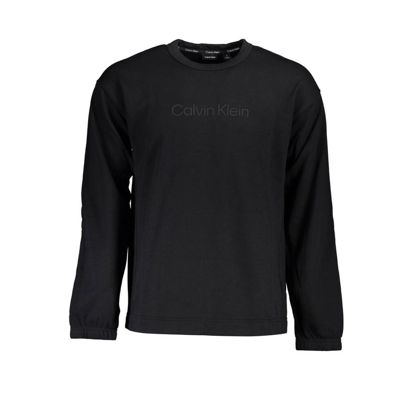 Black Cotton Men SweaterDare to make a bold style statement with this Calvin Klein sweatshirt – a masterpiece that flawlessly combines comfort with iconic fashion. Crafted from a superior blend of cotton and polyester, this sweatshirt offers a plush feel