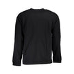 Black Cotton Men SweaterDare to make a bold style statement with this Calvin Klein sweatshirt – a masterpiece that flawlessly combines comfort with iconic fashion. Crafted from a superior blend of cotton and polyester, this sweatshirt offers a plush feel