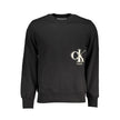 Black Cotton Men SweaterUnleash the essence of modern sophistication with this Calvin Klein sweatshirt. Its bold black hue complements the striking print and iconic logo, radiating trendsetting vibes with every wear. Crafted for comfort and style, this pi