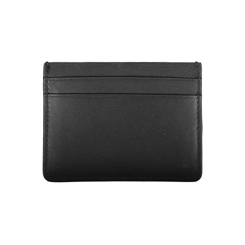 Black Leather Walletcard holder, 1 central pocket, print, logoBlack Leather Wallet${tagsCalvin KleinAulae Black Leather Wallet Calvin KleinAulae Black Leather Wallet card holder, 1 central pocket, print, logo 110296138070,11273,Accessories,Black,Calvin Kl