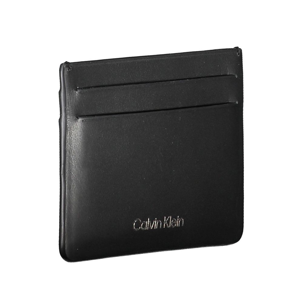 Black Leather Walletcard holder, 1 central pocket, print, logoBlack Leather Wallet${tagsCalvin KleinAulae Black Leather Wallet Calvin KleinAulae Black Leather Wallet card holder, 1 central pocket, print, logo 110296138070,11273,Accessories,Black,Calvin Kl
