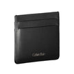 Black Leather Walletcard holder, 1 central pocket, print, logoBlack Leather Wallet${tagsCalvin KleinAulae Black Leather Wallet Calvin KleinAulae Black Leather Wallet card holder, 1 central pocket, print, logo 110296138070,11273,Accessories,Black,Calvin Kl