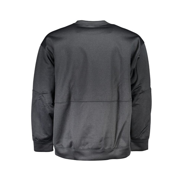 Black Polyester Men SweaterCrafted for the modern fashion maverick, this sleek Calvin Klein sweatshirt is emblematic of urban sophistication. Adorned with the iconic CK logo, this piece merges the comfort of long sleeves with the utility of zip pockets. C