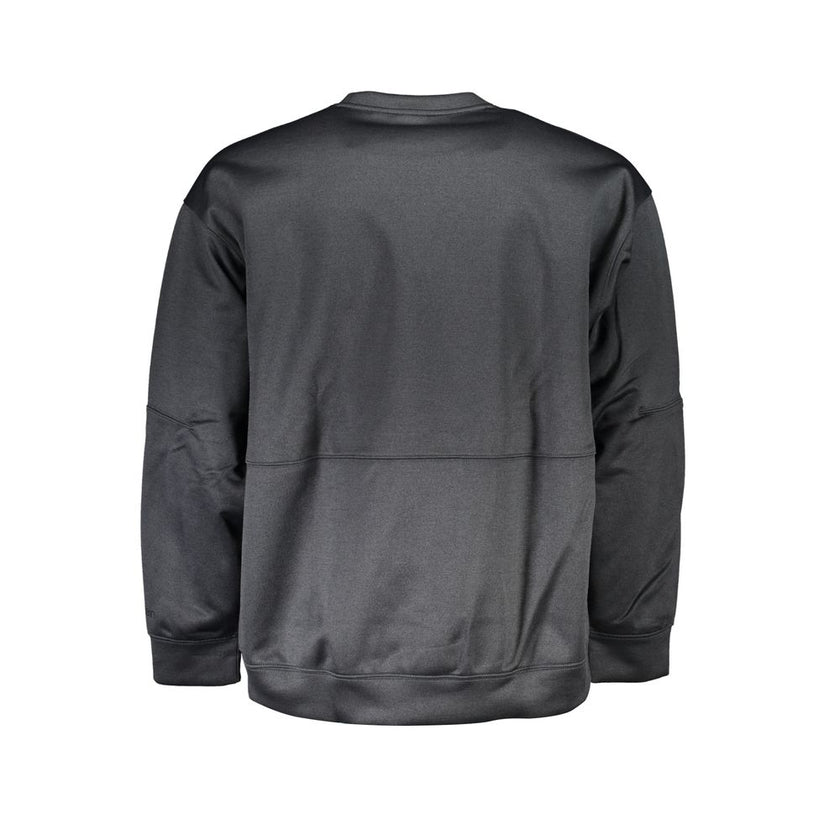 Black Polyester Men SweaterCrafted for the modern fashion maverick, this sleek Calvin Klein sweatshirt is emblematic of urban sophistication. Adorned with the iconic CK logo, this piece merges the comfort of long sleeves with the utility of zip pockets. C