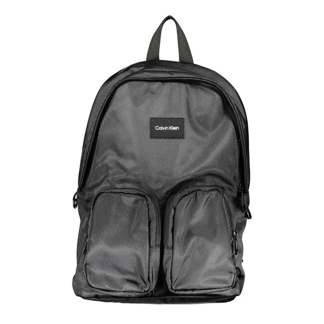 Black Polyester BackpackBACKPACK 1 HANDLE, ADJUSTABLE STRAPS, 2 EXTERNAL POCKETS, 1 LAP-TOP COMPARTMENT, 1 INTERNAL POCKET, CONTRASTING DETAILS, ZIP CLOSURE, LOGO, 50% RECYCLED POLYESTERBlack Polyester Backpack${tagsCalvin KleinAulae Black Polyester Backp
