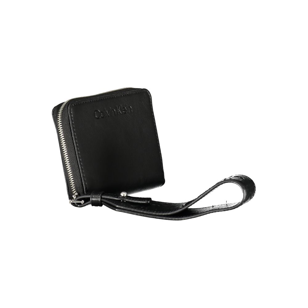 Black Polyester WalletWALLET WITH 2 COMPARTMENTS, COIN PURSE, SPACES FOR CARD, RFID BLOCKING, ZIP CLOSURE, REMOVABLE LONG PULL, LOGO, RECYCLED POLYESTERBlack Polyester Wallet${tagsCalvin KleinAulae Black Polyester Wallet Calvin KleinAulae Black Polyester