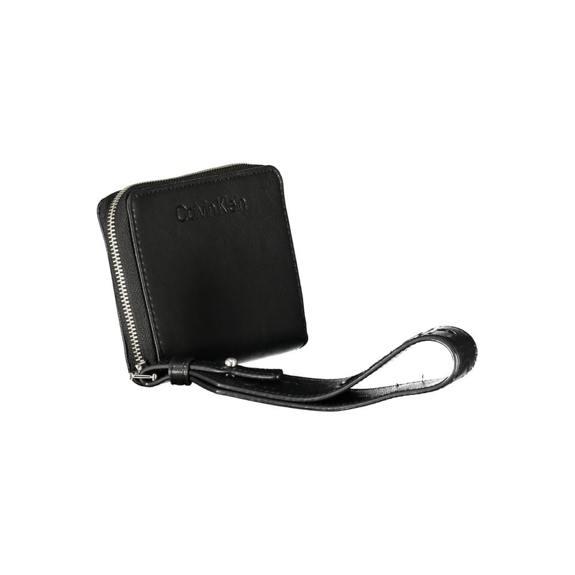Black Polyester WalletWALLET WITH 2 COMPARTMENTS, COIN PURSE, SPACES FOR CARD, RFID BLOCKING, ZIP CLOSURE, REMOVABLE LONG PULL, LOGO, RECYCLED POLYESTERBlack Polyester Wallet${tagsCalvin KleinAulae Black Polyester Wallet Calvin KleinAulae Black Polyester