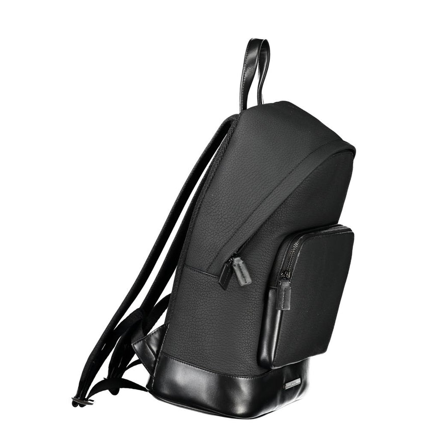 Black Polyester BackpackBACKPACK 1 HANDLE, ADJUSTABLE STRAPS, 1 EXTERNAL POCKET, 1 INTERNAL POCKET, LAP-TOP COMPARTMENT, ZIP CLOSURE, CONTRAST DETAILS, PROTECTIVE FEET, LOGO, RECYCLED POLYESTERBlack Polyester Backpack${tagsCalvin KleinAulae Black Polyeste