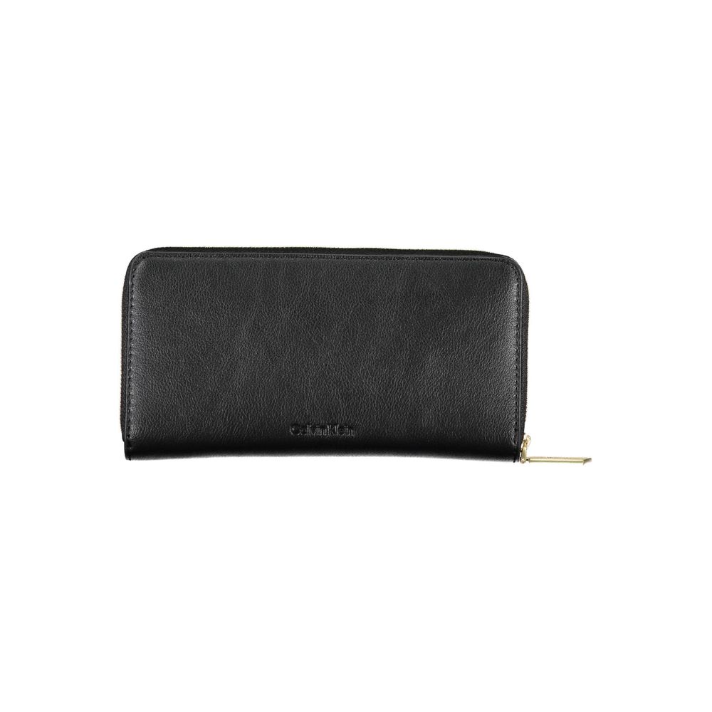 Black Polyester WalletWALLET WITH 5 COMPARTMENTS, COIN PURSE, DOUBLE SPACES FOR CARDS, RFID BLOCKING, ZIP CLOSURE, APPLICATION, CONTRAST DETAILS, LOGOBlack Polyester Wallet${tagsCalvin KleinAulae Black Polyester Wallet Calvin KleinAulae Black Polyester Wa