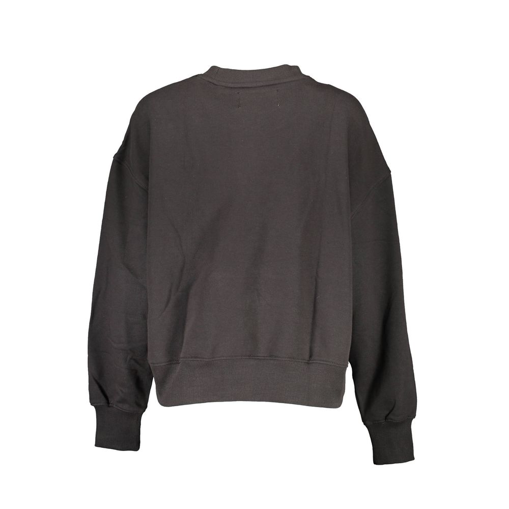 Black Cotton Women SweaterElevate your wardrobe with the timeless sophistication of Calvin Klein. This chic long sleeve sweatshirt boasts a sleek black cotton construction, designed with a comfortable crew neck to add a dash of effortless style to any ens