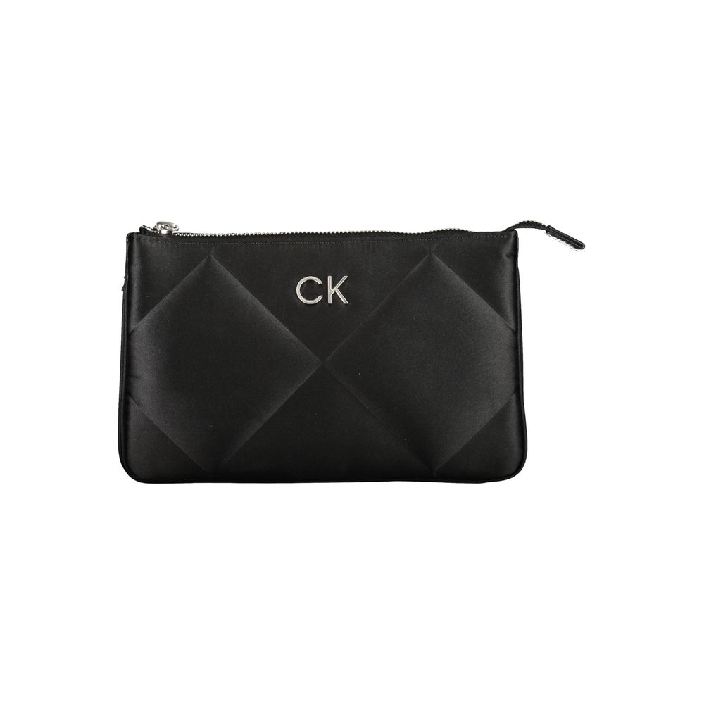 Black Polyester HandbagADJUSTABLE SHOULDER BAG, 2 COMPARTMENTS, 1 INTERNAL CARD POCKET, CONTRASTING DETAILS, ZIP CLOSURE, LOGO, 95% RECYCLED POLYESTERBlack Polyester Handbag${tagsCalvin KleinAulae Black Polyester Handbag Calvin KleinAulae Black Polyester