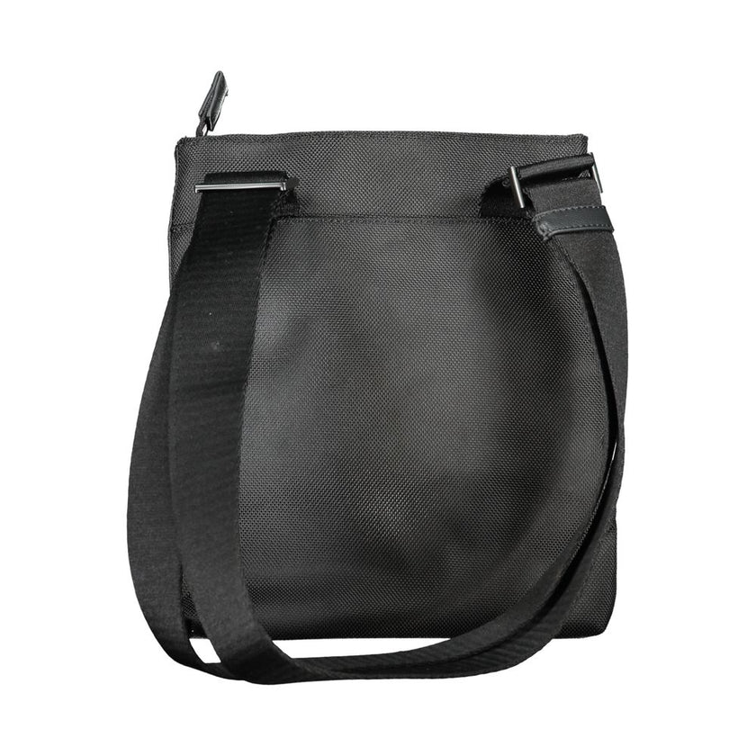 Black Polyester Shoulder BagADJUSTABLE SHOULDER STRAP, 1 EXTERNAL POCKET, 1 INTERNAL POCKET, ZIP CLOSURE, LOGO, 95% POLYESTER RECYCLEDBlack Polyester Shoulder Bag${tagsCalvin KleinAulae Black Polyester Shoulder Bag Calvin KleinAulae Black Polyester Should