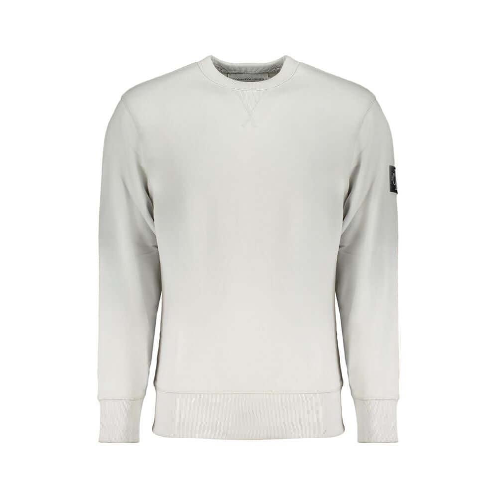 Gray Cotton Men SweaterUnleash the epitome of urban sophistication with this Calvin Klein masterpiece. A symphony of style and sustainability, this long sleeve sweatshirt is your ticket to effortless fashion. Its crew neck design and brushed interior boas