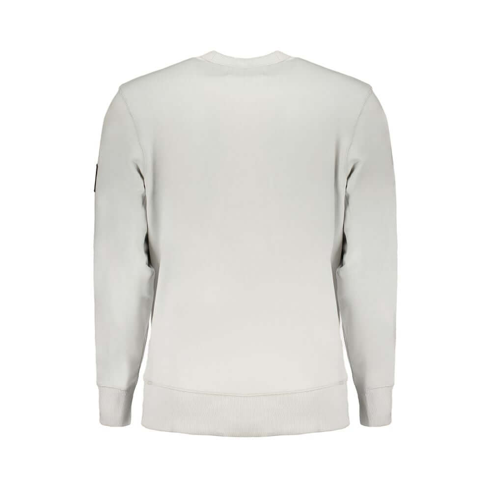 Gray Cotton Men SweaterUnleash the epitome of urban sophistication with this Calvin Klein masterpiece. A symphony of style and sustainability, this long sleeve sweatshirt is your ticket to effortless fashion. Its crew neck design and brushed interior boas
