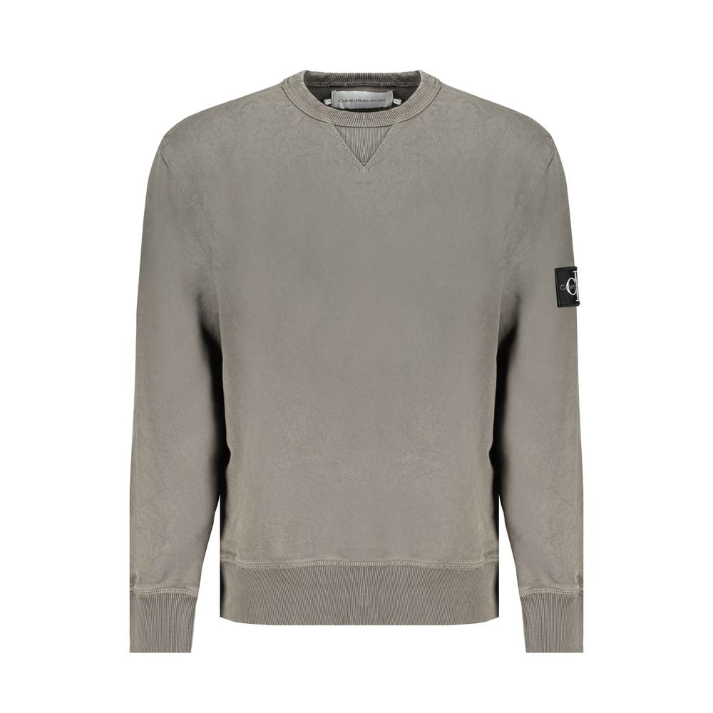 Green Cotton Men SweaterEmbrace the fusion of comfort and style with this Calvin Klein Long Sleeve Sweatshirt. A chic crew neck design meets the bold statement of the iconic Calvin Klein logo, making it an instant staple for your wardrobe. Tailored from 9