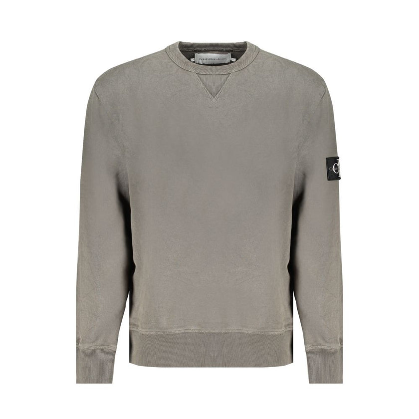 Green Cotton Men SweaterEmbrace the fusion of comfort and style with this Calvin Klein Long Sleeve Sweatshirt. A chic crew neck design meets the bold statement of the iconic Calvin Klein logo, making it an instant staple for your wardrobe. Tailored from 9