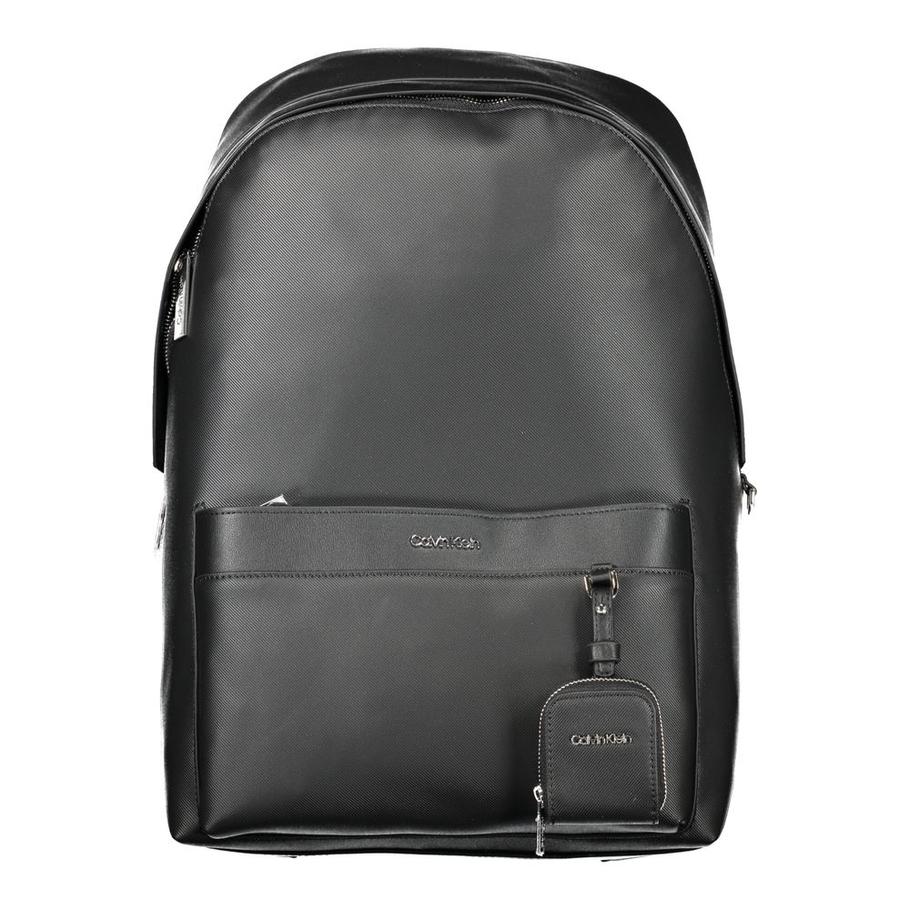 Black Polyester BackpackBACKPACK 1 HANDLE, ADJUSTABLE SHOULDER STRAPS, 1 EXTERNAL POCKET, 1 REMOVABLE EXTERNAL COIN PURSE, 1 INTERNAL COMPARTMENT, CONTRASTING DETAILS, ZIP CLOSURE, LOGO, 50% RECYCLED POLYESTERBlack Polyester Backpack${tagsCalvin KleinAula
