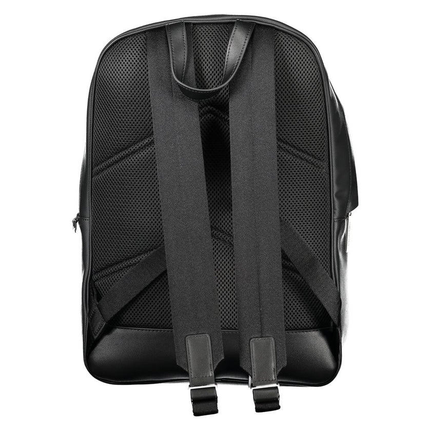 Black Polyester BackpackBACKPACK 1 HANDLE, ADJUSTABLE SHOULDER STRAPS, 1 EXTERNAL POCKET, 1 REMOVABLE EXTERNAL COIN PURSE, 1 INTERNAL COMPARTMENT, CONTRASTING DETAILS, ZIP CLOSURE, LOGO, 50% RECYCLED POLYESTERBlack Polyester Backpack${tagsCalvin KleinAula