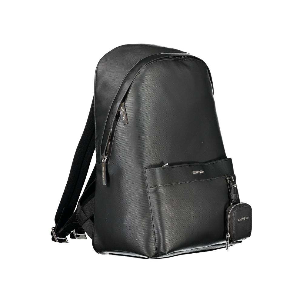 Black Polyester BackpackBACKPACK 1 HANDLE, ADJUSTABLE SHOULDER STRAPS, 1 EXTERNAL POCKET, 1 REMOVABLE EXTERNAL COIN PURSE, 1 INTERNAL COMPARTMENT, CONTRASTING DETAILS, ZIP CLOSURE, LOGO, 50% RECYCLED POLYESTERBlack Polyester Backpack${tagsCalvin KleinAula
