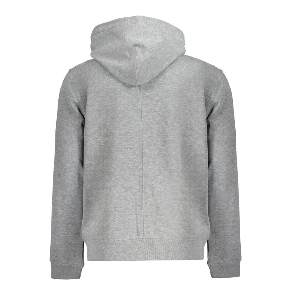 Gray Polyester Men SweaterElevate your casual wardrobe with the Calvin Klein Long Sleeve Sport Hoodie, a testament to eco-conscious fashion. This brushed hoodie doesn’t just make a statement with its bold logo print but also with its commitment to sustain