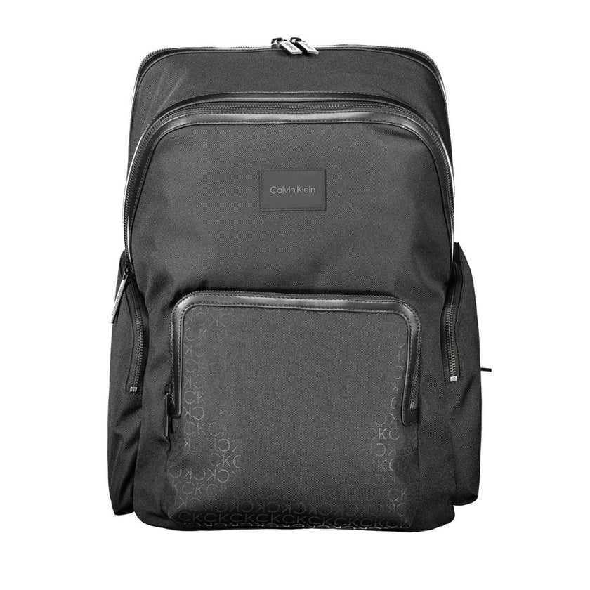 Black Polyester BackpackBACKPACK WITH 1 HANDLE, ADJUSTABLE SHOULDER STRAPS, 1 EXTERNAL POCKET, 2 EXTERNAL SIDE POCKETS, 1 LAPTOP COMPARTMENT, ANOTHER COMPARTMENT, 3 INTERNAL POCKETS, INTERNAL PEN HOLDER SPACES, CONTRASTING DETAILS, ZIP CLOSURE, LOGO, 95%