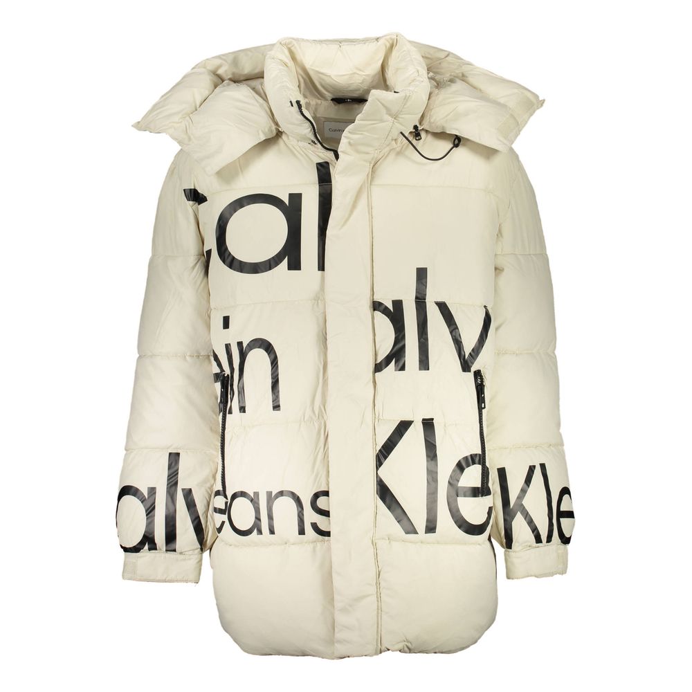 Beige Polyester Men JacketDare to stand out with Calvin Klein’s eco-conscious twist on a classic. This long-sleeved jacket boasts a detachable hood, marrying functionality with high-end fashion. Its beige hue is elegantly accented with contrasting details