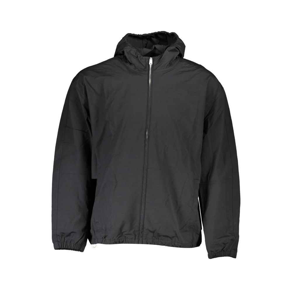Black Cotton Men's JacketIntroducing the sleek and versatile Calvin Klein sports jacket – the ultimate fusion of functionality and style. Crafted for those who dare to stand out, this black jacket boasts long sleeves, a practical hood, and a smart zip clo