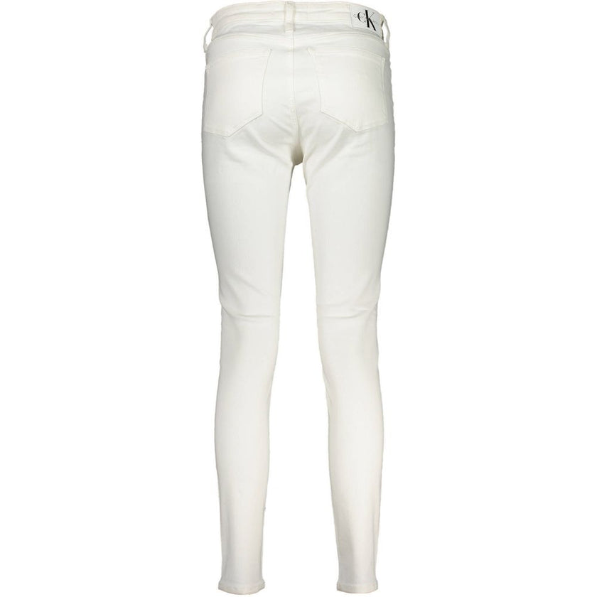 White Cotton Women JeansStep into sophistication with these pristine white Calvin Klein skinny jeans, designed for the modern fashion connoisseur. Crafted from a premium blend that ensures both comfort and durability, these jeans are a testament to timele