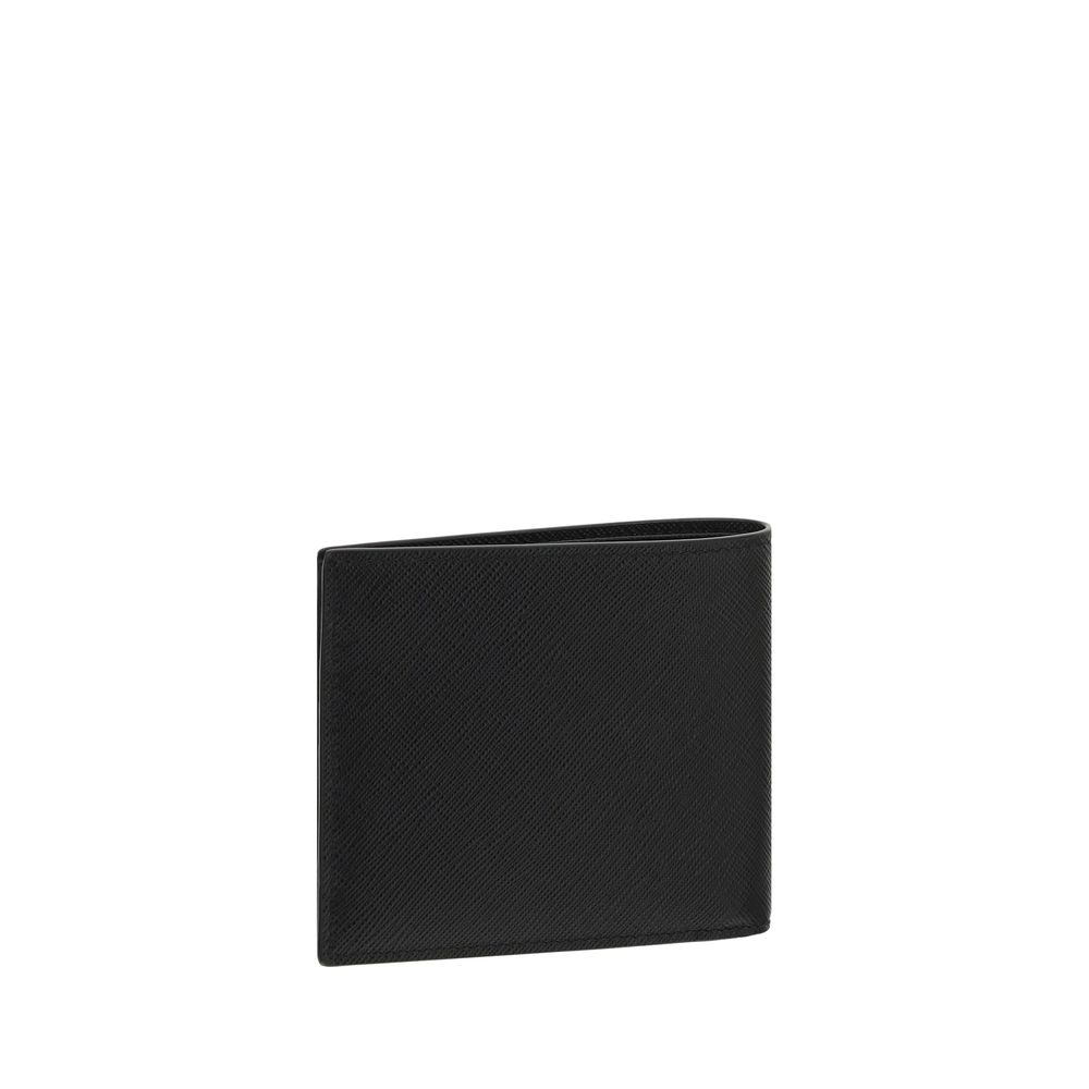 Black Calf Leather Bos Taurus WalletPrada’s Leather Wallet is a stylish and functional accessory with a classic billfold design. Featuring a contrasting logo plaque on the front, it offers card slots and a billfold compartment, ensuring practical and neat