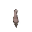 Slingback PumpsGucci’s slingback Pumps, part of the Gucci Lido line, evoke the summer spirit and relaxed atmosphere of beach clubs on the Italian coast. Made of Original GG fabric in beige and brown tones, they are enhanced by brown leather trim and light