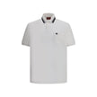 Logoed Polo ShirtCotton Polo Shirt by Gucci, perfect for a casual yet detail-oriented style. It features a classic collar with contrasting piping, buttons on the front and a logoed welt pocket applied to the chest. Side slits provide added comfort and fre