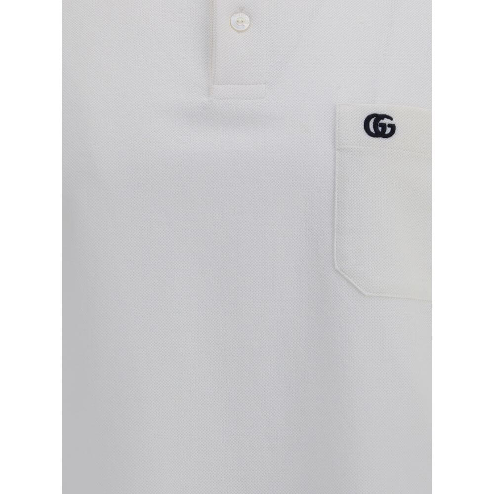 Logoed Polo ShirtCotton Polo Shirt by Gucci, perfect for a casual yet detail-oriented style. It features a classic collar with contrasting piping, buttons on the front and a logoed welt pocket applied to the chest. Side slits provide added comfort and fre