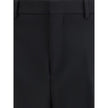 Black Wool Dress PantsGucci’s Wool Pants feature Double G embroidery, the house’s iconic symbol. They feature a hidden inside waist seam, belt loops, two side slash pockets and two back pockets. The split hem adds a modern detail, while the button-and-zip