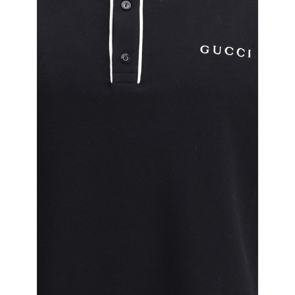 Black Cotton Polo ShirtCotton Polo Shirt by Gucci features a refined design with iconic details. Featuring a classic collar with contrasting profile and buttons on the front, it is embellished with the iconic contrasting monogram on the chest. Side slits