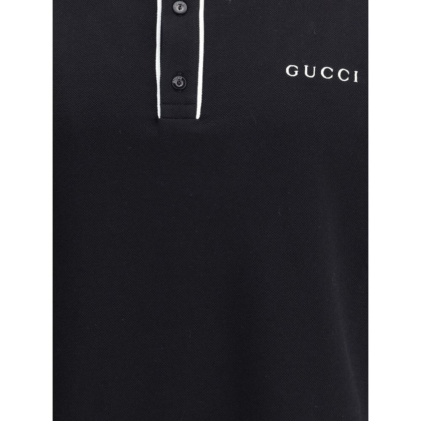 Black Cotton Polo ShirtCotton Polo Shirt by Gucci features a refined design with iconic details. Featuring a classic collar with contrasting profile and buttons on the front, it is embellished with the iconic contrasting monogram on the chest. Side slits