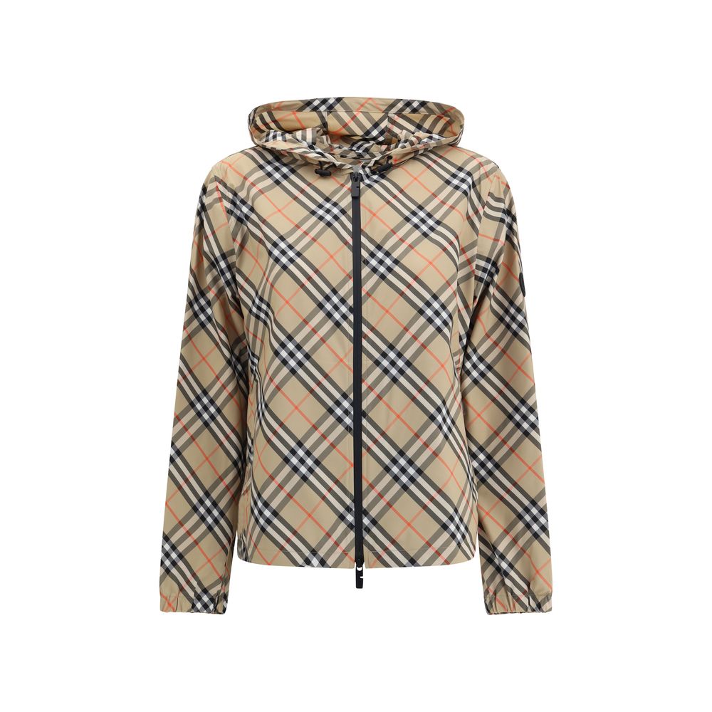 Beige Polyester Shell JacketBurberry’s waterproof Jacket combines functionality with iconic style. Equipped with an adjustable drawstring hood, it features the famous Archivio Check pattern that recalls the brand’s heritage. The front zipper closure and t