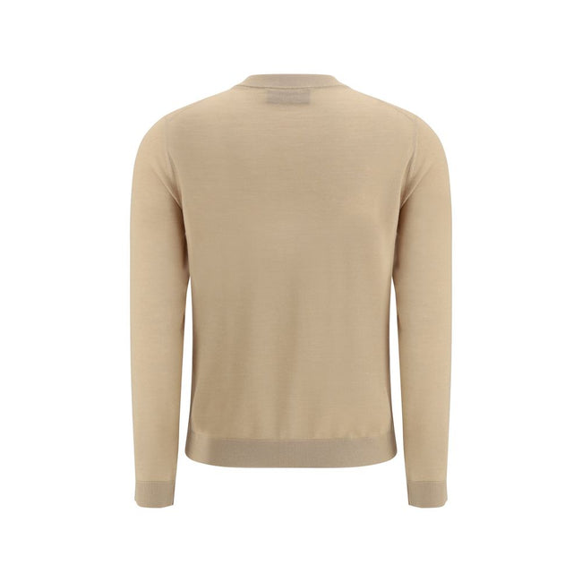 Beige Cashmere CardiganGucci’s cashmere Cardigan is a timeless garment, the epitome of elegance and comfort. Featuring a ribbed crew neck, hem and cuffs, it has a front button closure and two small patch pockets on the front. The iconic stitched signature