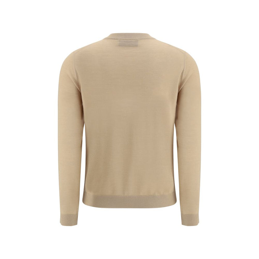 Beige Cashmere CardiganGucci’s cashmere Cardigan is a timeless garment, the epitome of elegance and comfort. Featuring a ribbed crew neck, hem and cuffs, it has a front button closure and two small patch pockets on the front. The iconic stitched signature