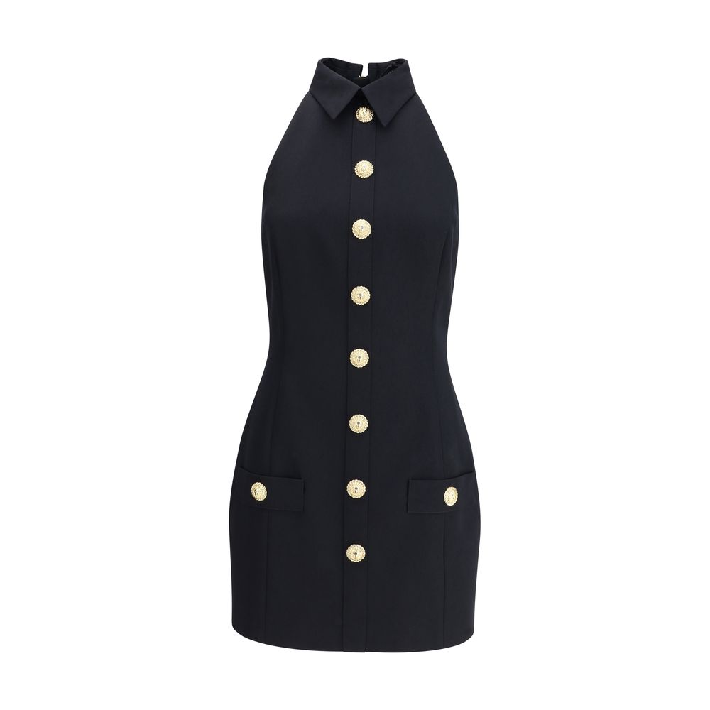 Black Fleece Wool Casual DressBalmain’s Sleeveless Short Dress is a garment with a structured cut and strong elegance. Featuring a classic collar and embossed buttons reminiscent of the house’s iconic style, it has two welt pockets on the front that add a