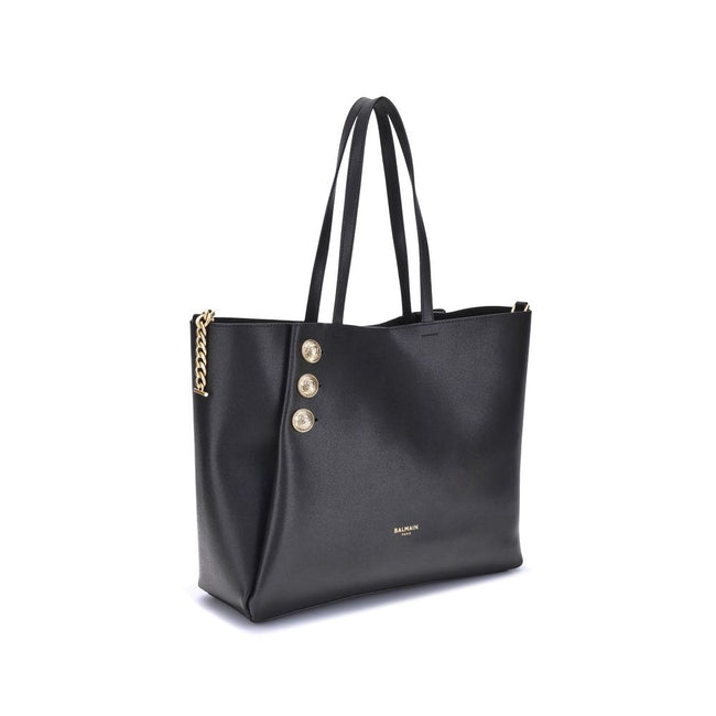 Black Calf Leather Bos Taurus Shoulder BagBalmain’s Emblème leather Tote Bag has a structured and elegant design. Equipped with two flat top handles, it features a trompe-l’œil magnetic button closure, enriched with three decorative gold metal 