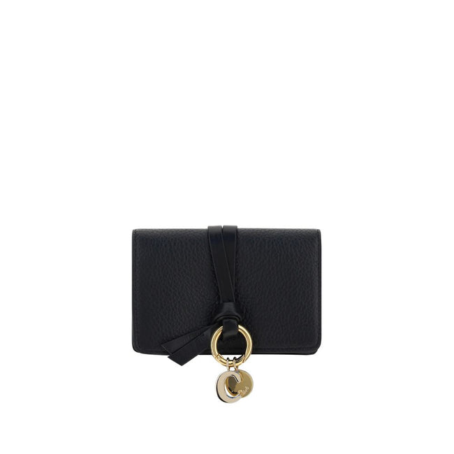 Black Calf Leather Bos Taurus WalletAlphabet by Chloé Wallet in grained leather, elegant and functional. Featuring a charm detail that adds a touch of personality, it has a snap-button closure for security and convenience. Inside, it features a main compa