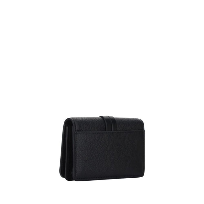 Black Calf Leather Bos Taurus WalletAlphabet by Chloé Wallet in grained leather, elegant and functional. Featuring a charm detail that adds a touch of personality, it has a snap-button closure for security and convenience. Inside, it features a main compa