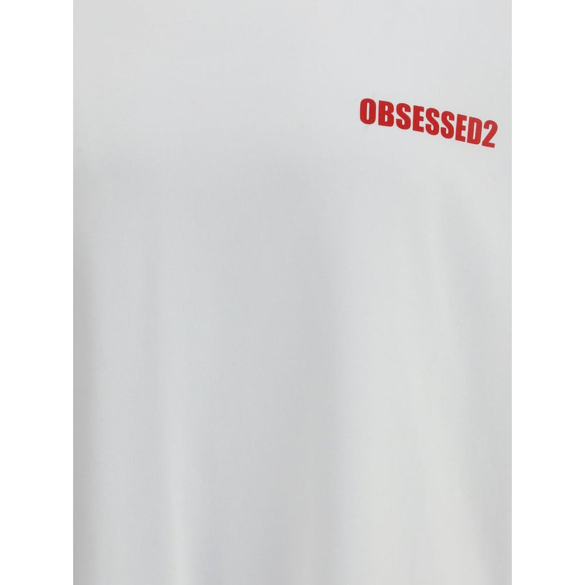 White Cotton T-ShirtDsquared2’s T-Shirt is a casual piece with a strong character, made from cotton and finished with a classic ribbed crew neck. The contrasting Obsessed2 print stands out on the front and the iconic signature on the back adds a graphic a
