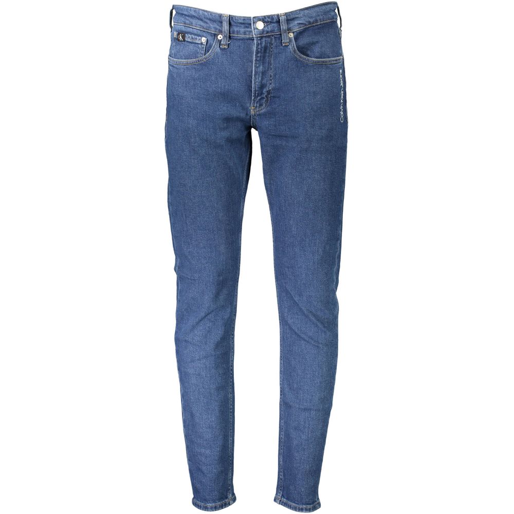 Blue Cotton Men JeansElevate your wardrobe with these quintessential Calvin Klein slim taper jeans, crafted for the modern trendsetter. These jeans flaunt a classic five-pocket construction combined with a sleek button and zip closure. The subtle embroide
