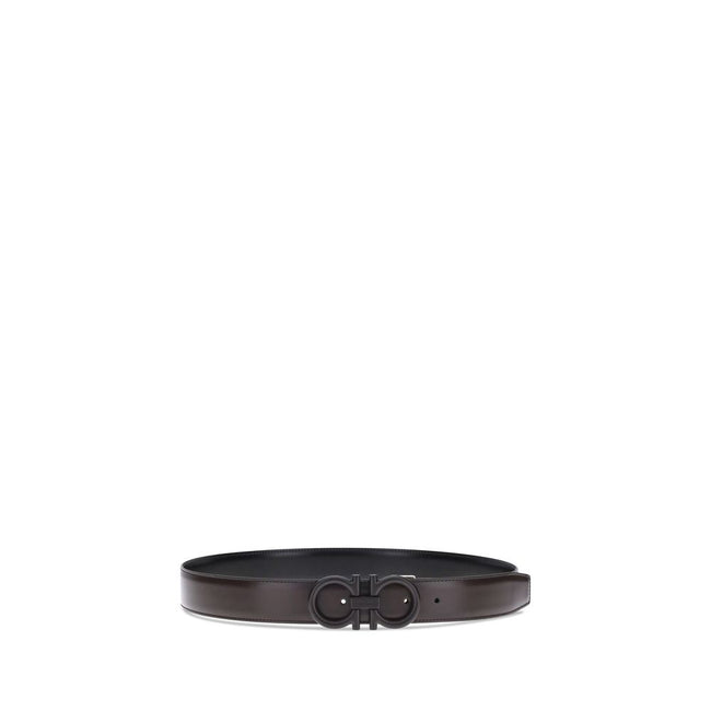 Black Calf Leather Bos Taurus Regular BeltFerragamo’s Gancini Reversible Belt celebrates the iconic Gancini, which here is transformed into the distinctive round-wire buckle with tone-on-tone varnishing. The smooth calfskin shaft adds a metropolitan note,