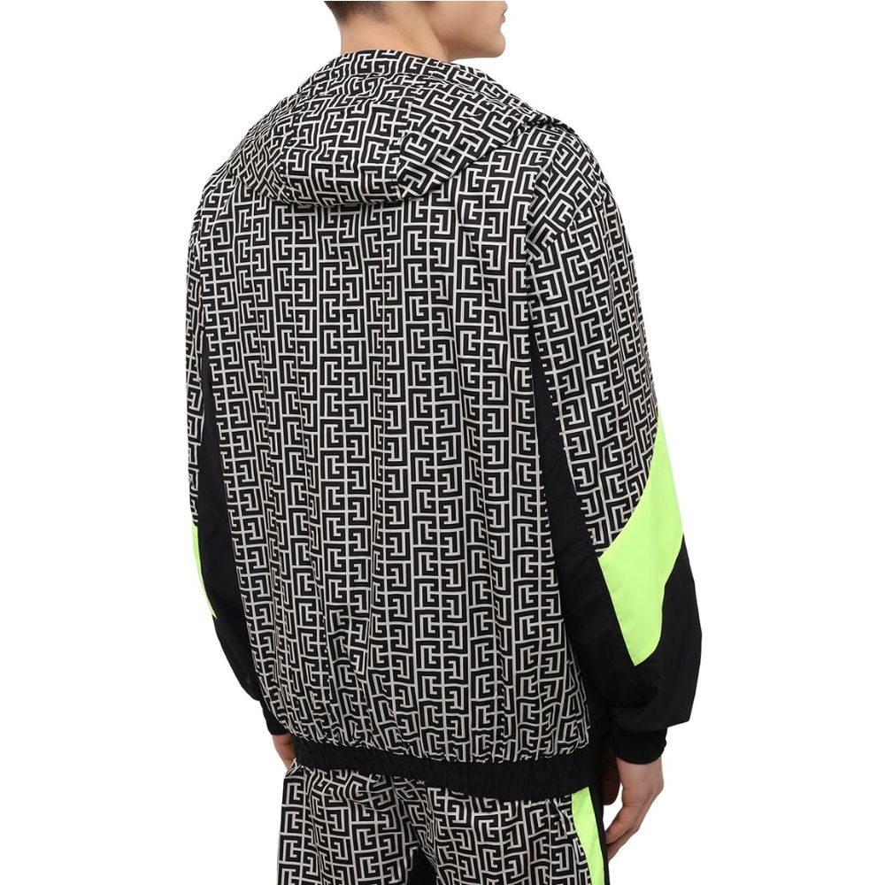 Multicolor Nylon Men JacketElevate your outerwear with this striking Balmain nylon jacket, showcasing a bold geometric pattern print that commands attention. Neon yellow stripes race down the sides and sleeves, adding a vibrant pop of color. Function meet