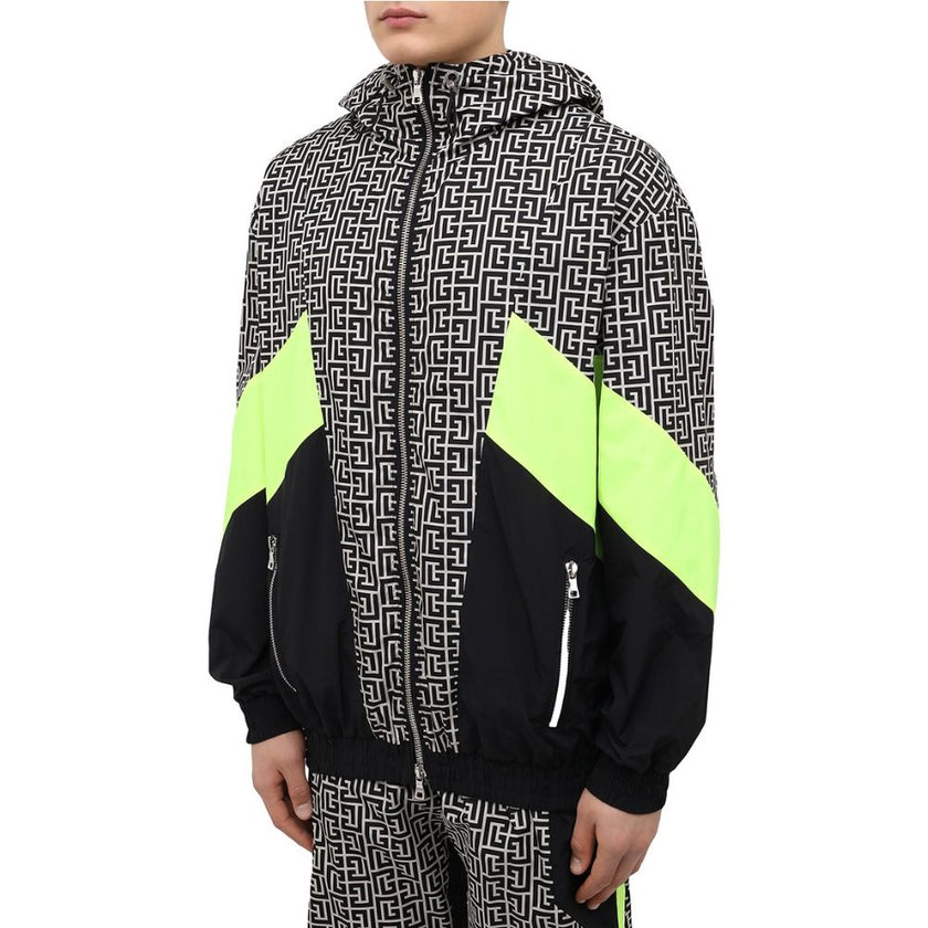 Multicolor Nylon Men JacketElevate your outerwear with this striking Balmain nylon jacket, showcasing a bold geometric pattern print that commands attention. Neon yellow stripes race down the sides and sleeves, adding a vibrant pop of color. Function meet